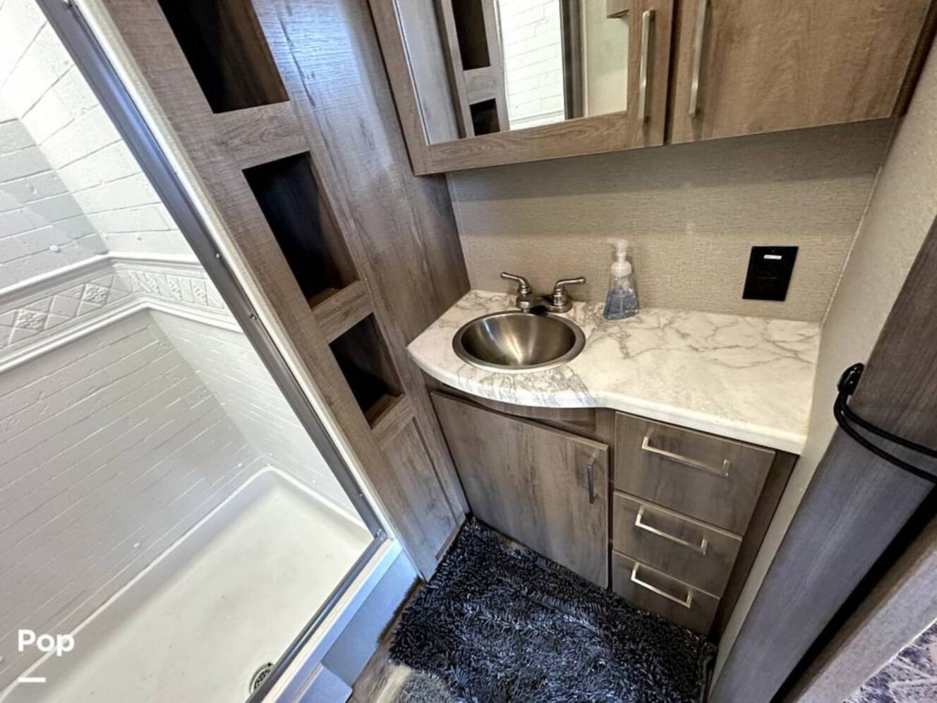 A photo of this 2022 Grand Design Imagine 2970RL