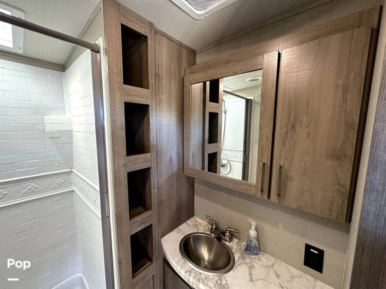 A photo of this 2022 Grand Design Imagine 2970RL