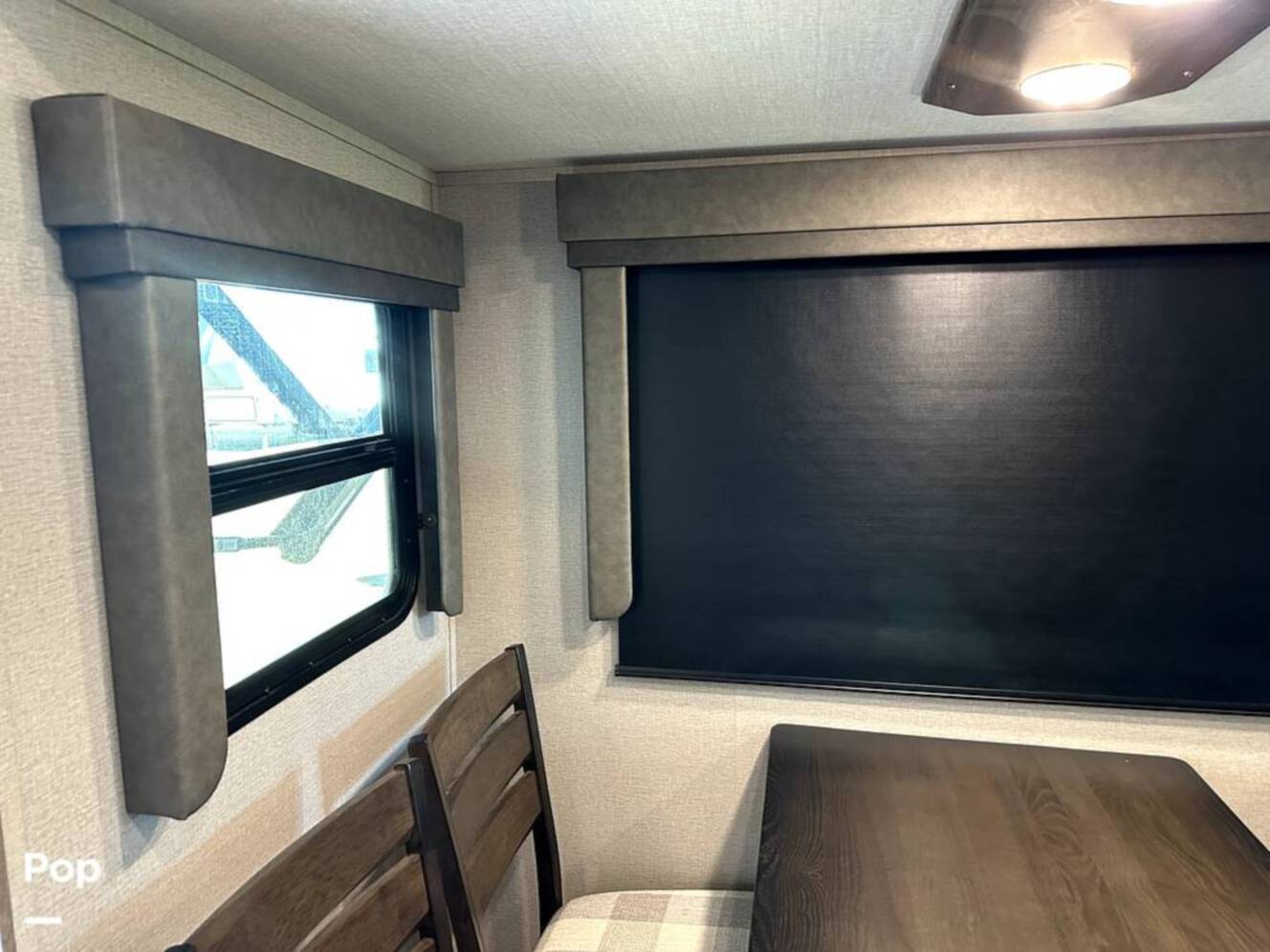 A photo of this 2022 Grand Design Imagine 2970RL