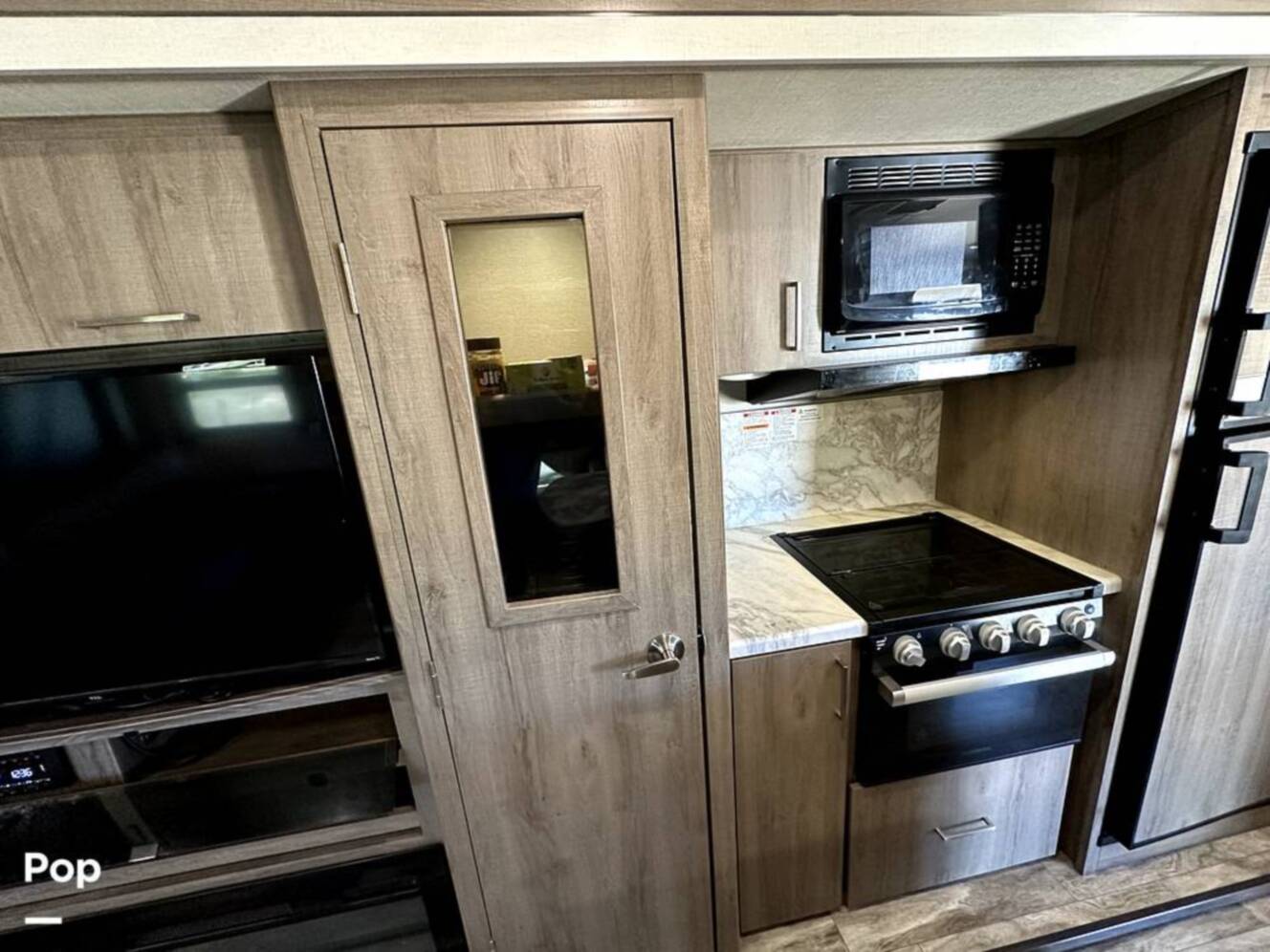 A photo of this 2022 Grand Design Imagine 2970RL