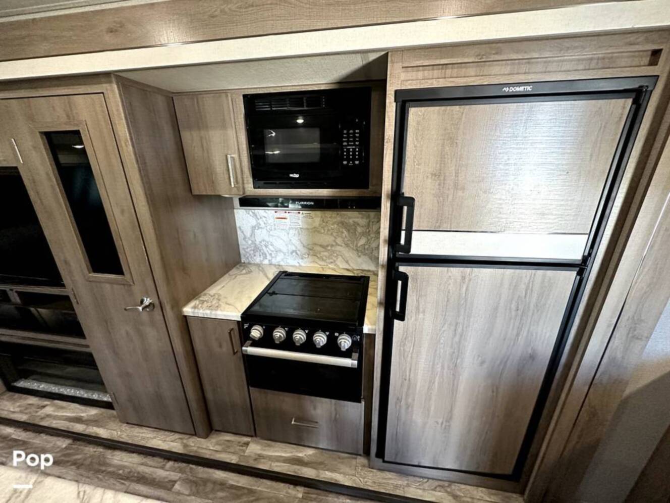 A photo of this 2022 Grand Design Imagine 2970RL