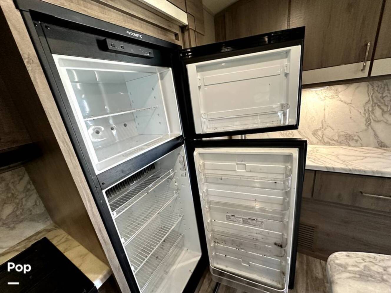 A photo of this 2022 Grand Design Imagine 2970RL