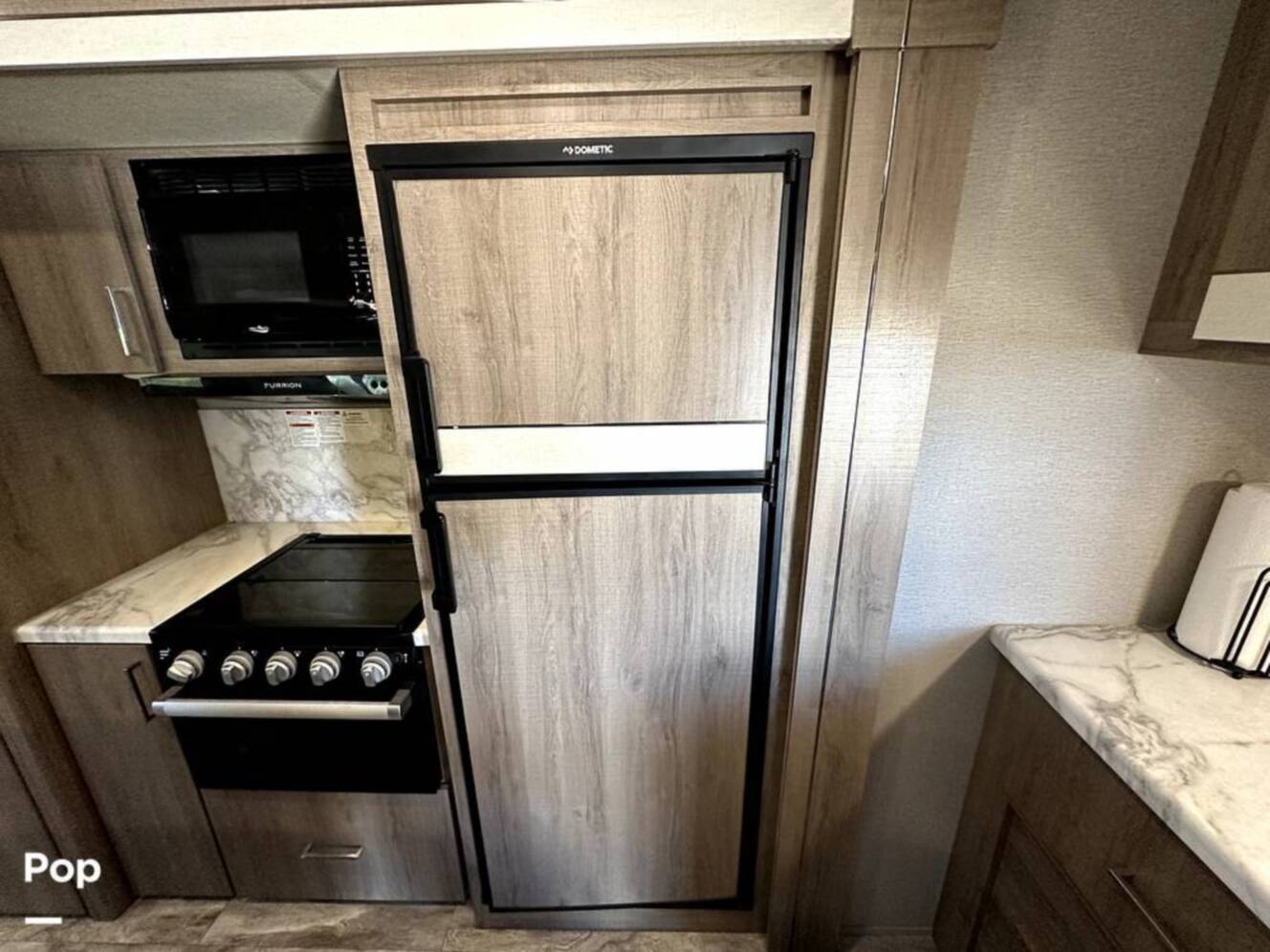 A photo of this 2022 Grand Design Imagine 2970RL