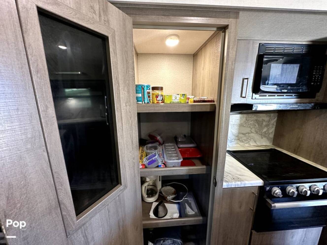 A photo of this 2022 Grand Design Imagine 2970RL