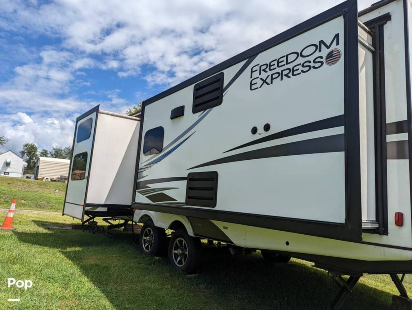 A photo of this 2021 Coachmen Freedom Express 323 BHDS