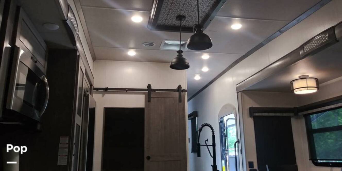A photo of this 2021 Forest River Cedar Creek 377BH