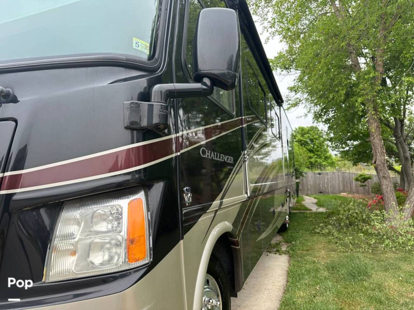 A photo of this 2013 Thor Motor Coach Challenger 37DT