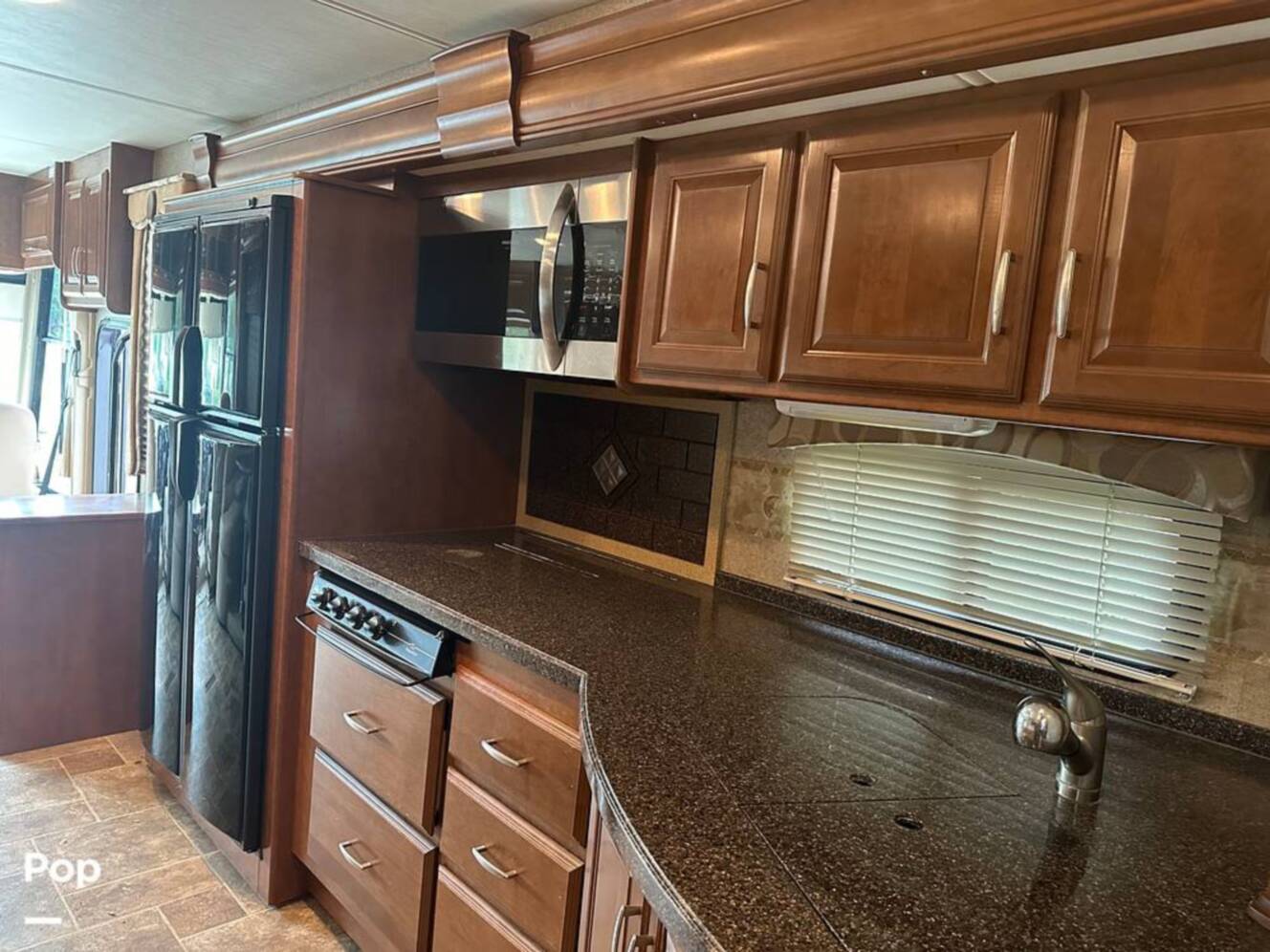 A photo of this 2013 Thor Motor Coach Challenger 37DT