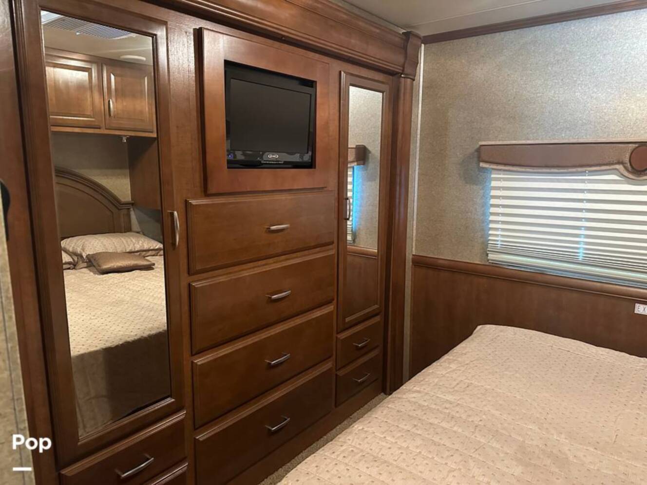 A photo of this 2013 Thor Motor Coach Challenger 37DT
