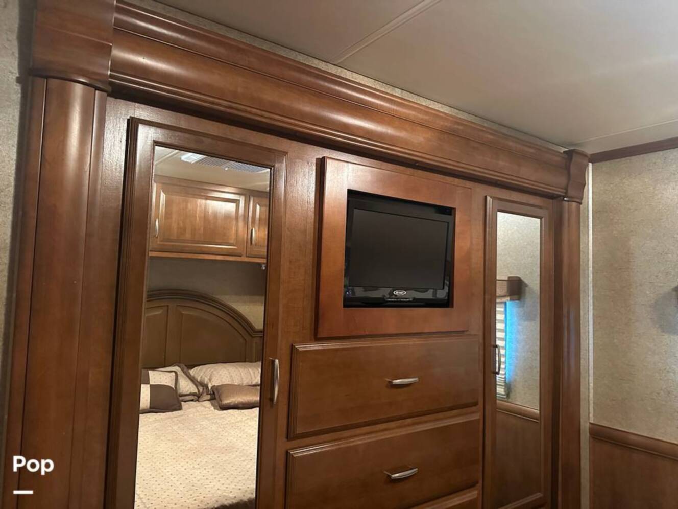 A photo of this 2013 Thor Motor Coach Challenger 37DT