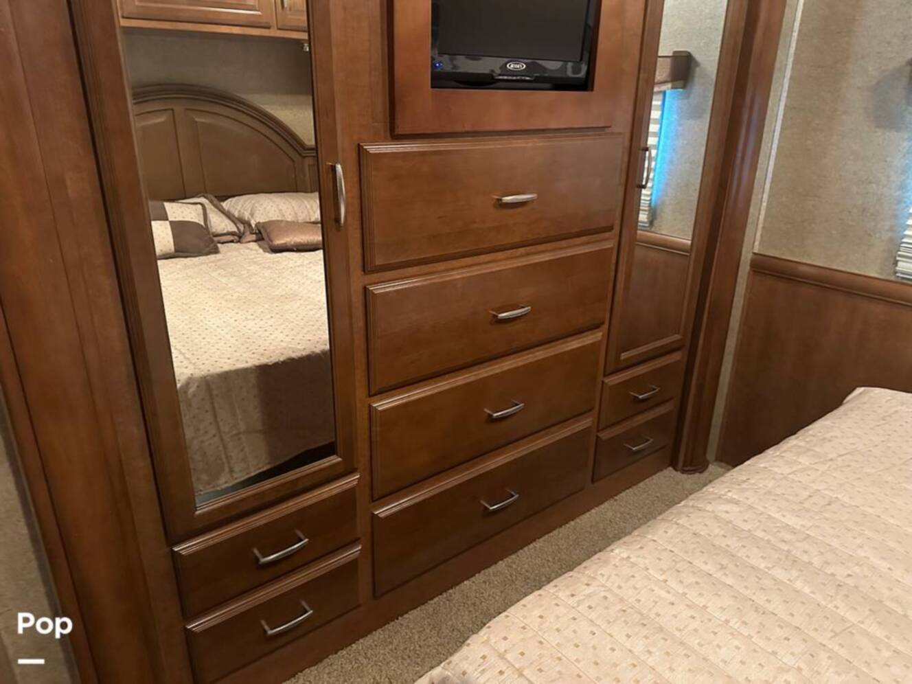 A photo of this 2013 Thor Motor Coach Challenger 37DT