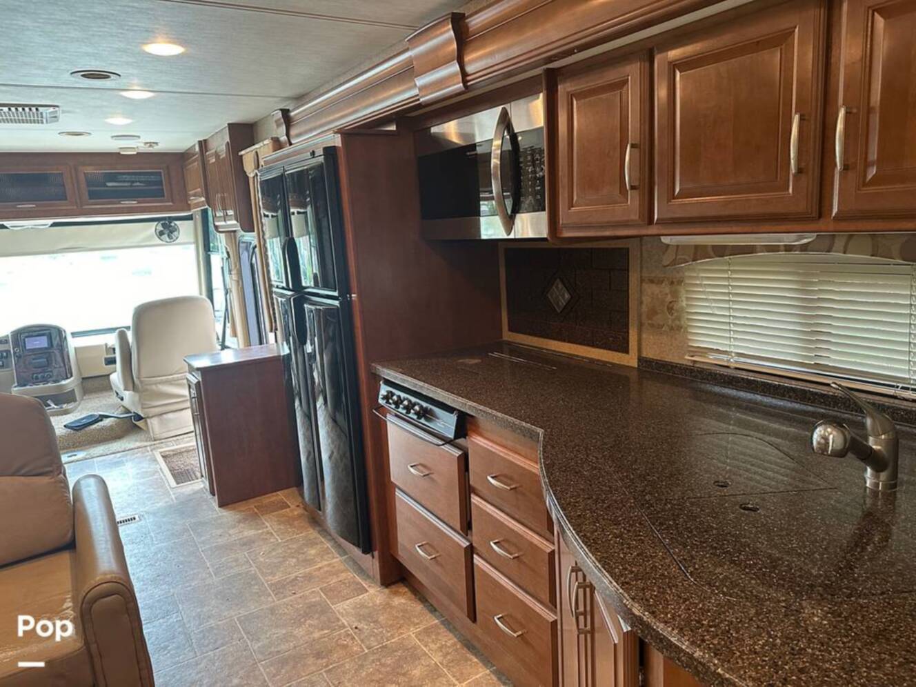 A photo of this 2013 Thor Motor Coach Challenger 37DT