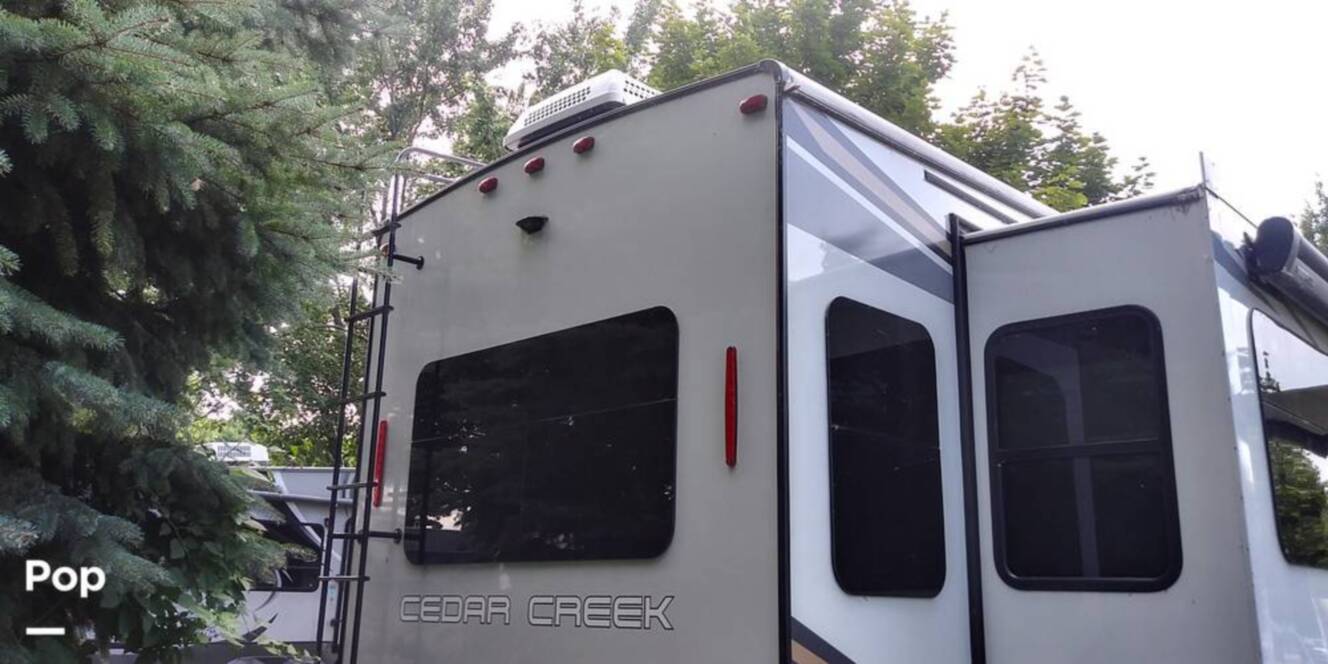 A photo of this 2021 Forest River Cedar Creek 377BH