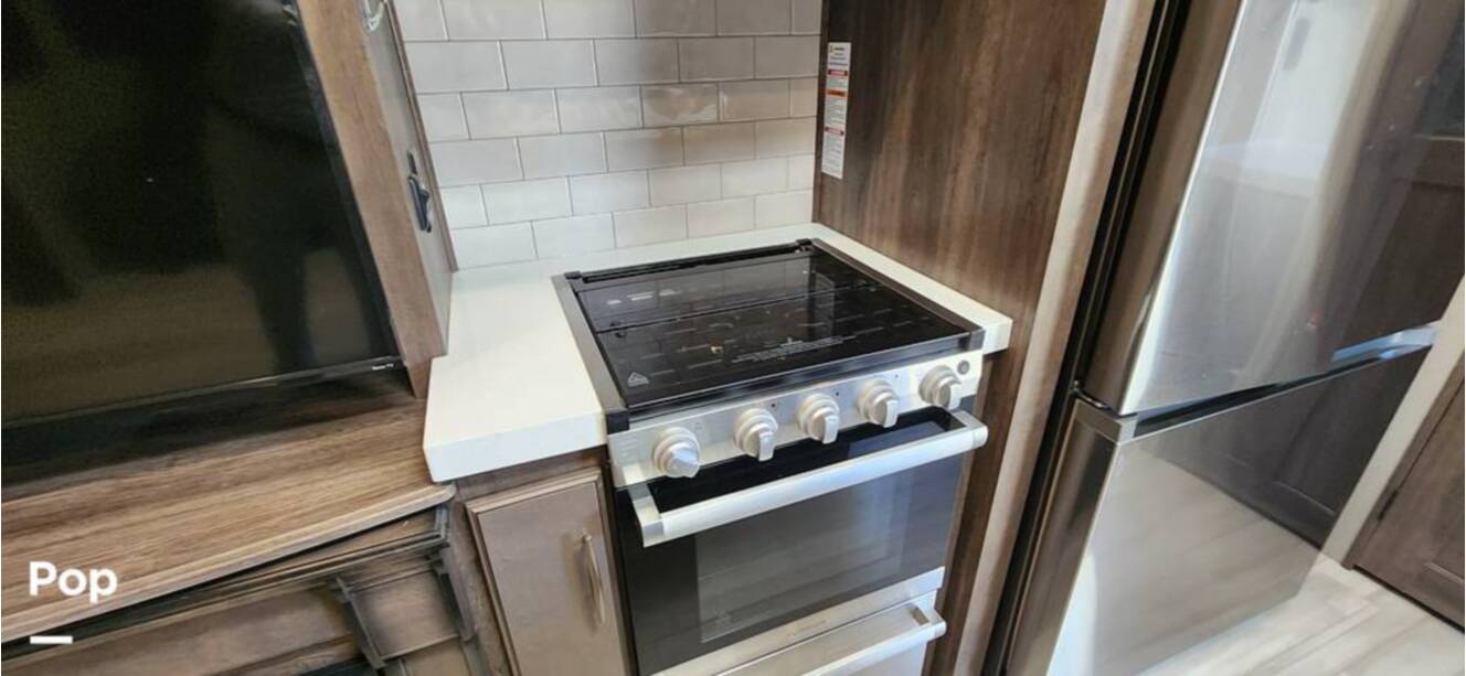 A photo of this 2021 Grand Design Solitude 3950BHR