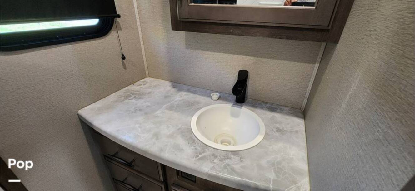 A photo of this 2021 Grand Design Solitude 3950BHR