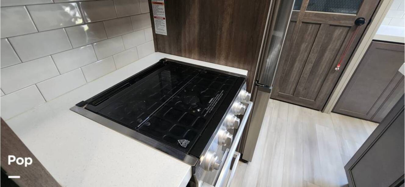 A photo of this 2021 Grand Design Solitude 3950BHR