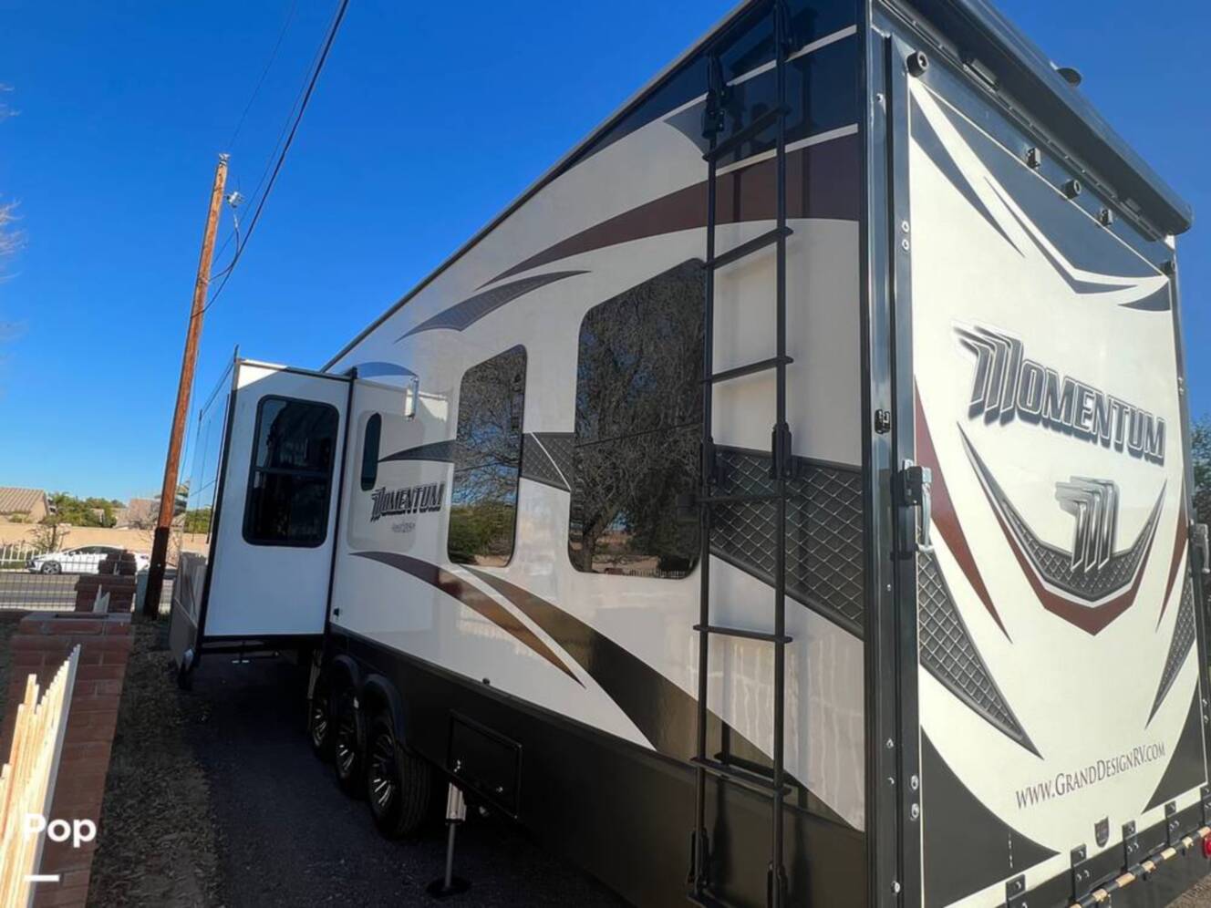 A photo of this 2017 Grand Design Momentum 399th