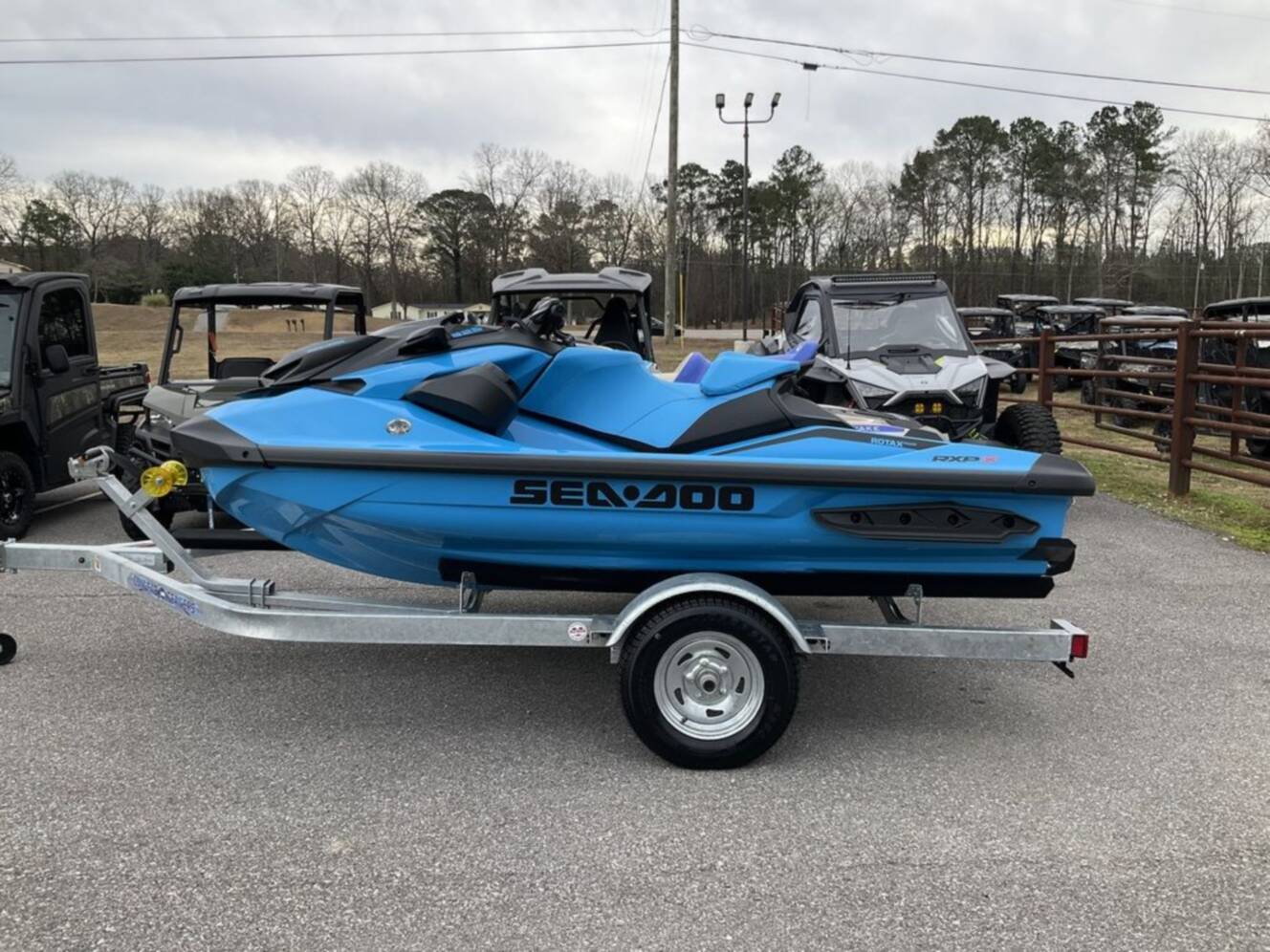 A photo of this 2026 Sea-Doo RXP-X 325 Tech, BRP Premium A, iBR Gulfstream Blue P