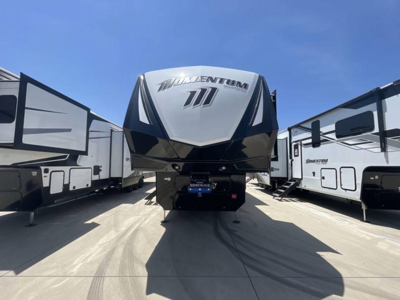 A photo of this 2025 Grand Design Momentum M-Class 392M