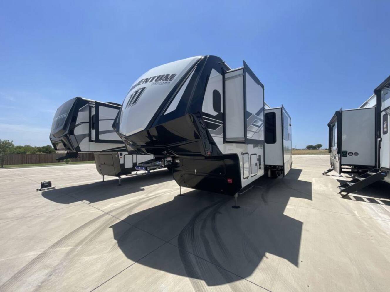 A photo of this 2025 Grand Design Momentum M-Class 392M