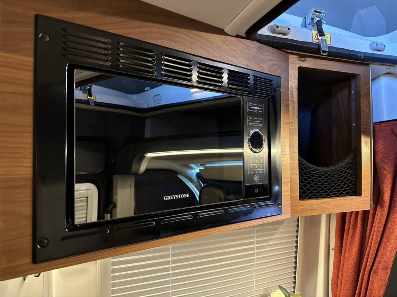 A photo of this 2023 Winnebago ROAM 59RX