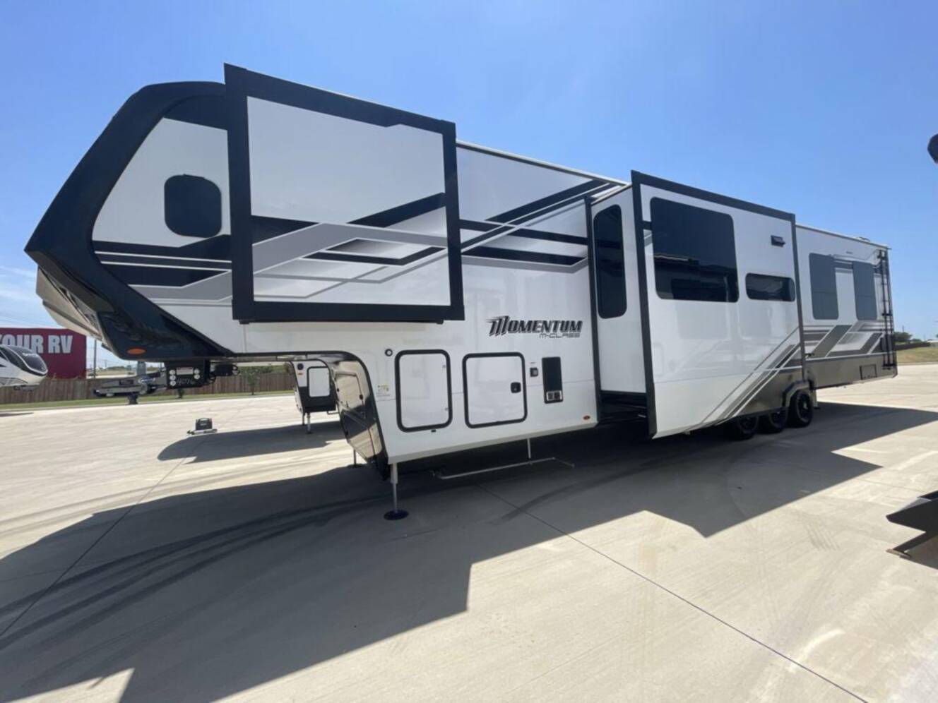 A photo of this 2025 Grand Design Momentum M-Class 392M