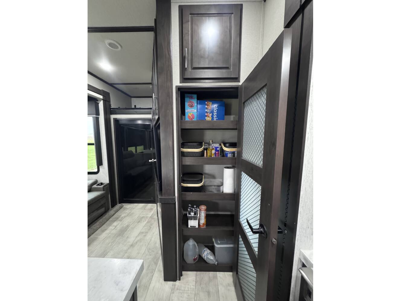 A photo of this 2022 Grand Design MOMENTUM 397TH