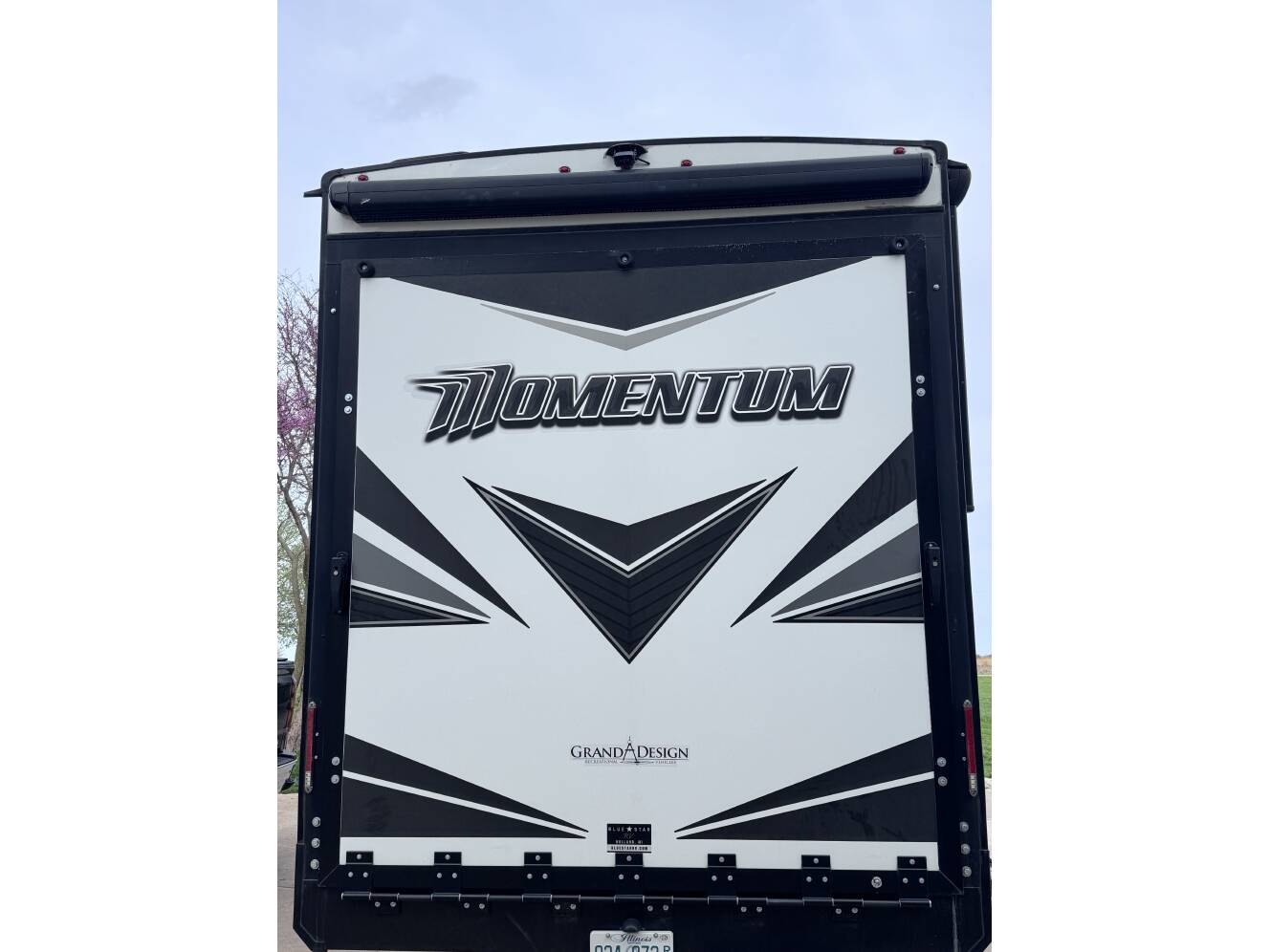 A photo of this 2022 Grand Design MOMENTUM 397TH