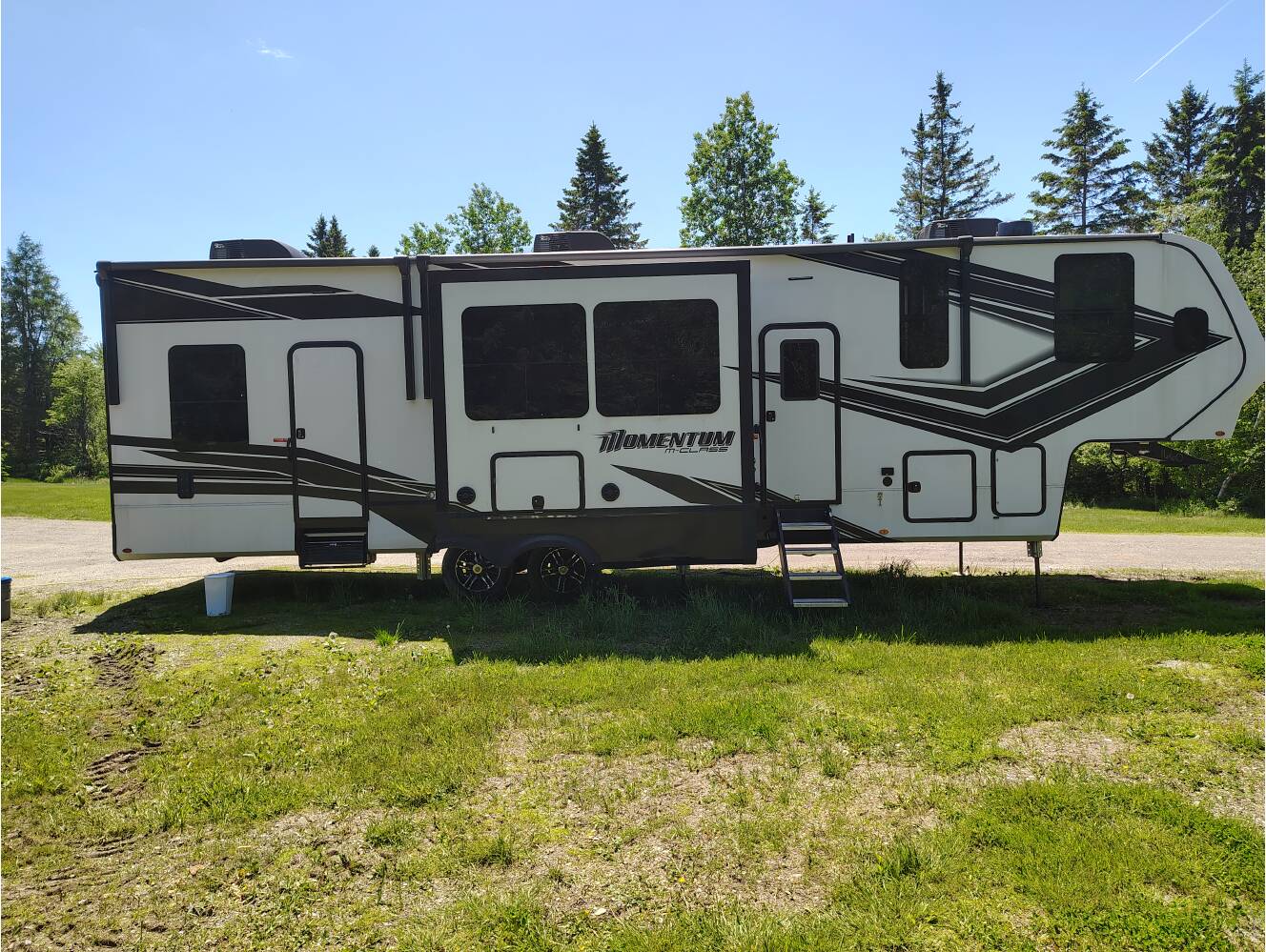 A photo of this 2022 Grand Design MOMENTUM M-CLASS 351MR