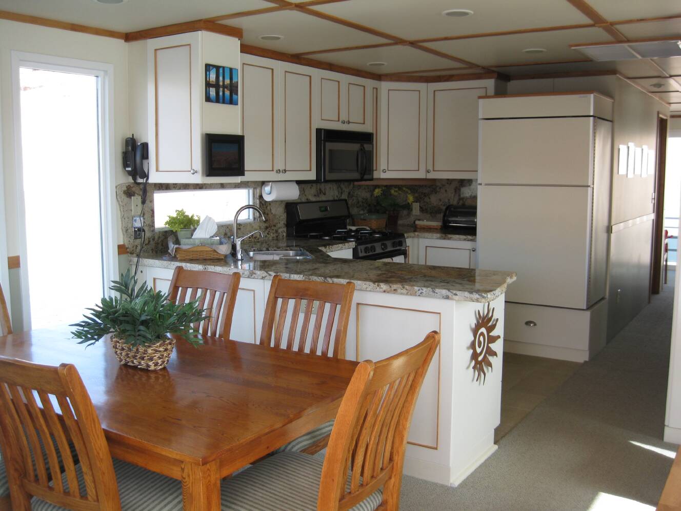 A photo of this 2004 Custom Houseboat