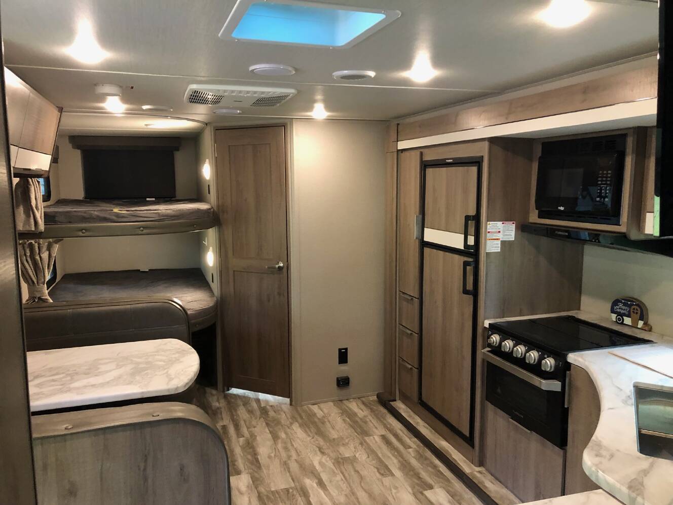 A photo of this 2021 Grand Design IMAGINE XLS 23BHE