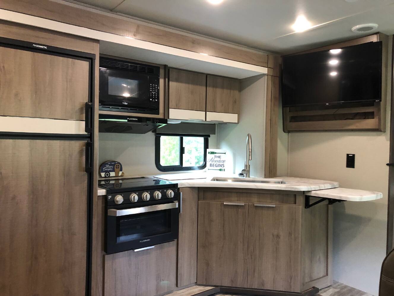 A photo of this 2021 Grand Design IMAGINE XLS 23BHE