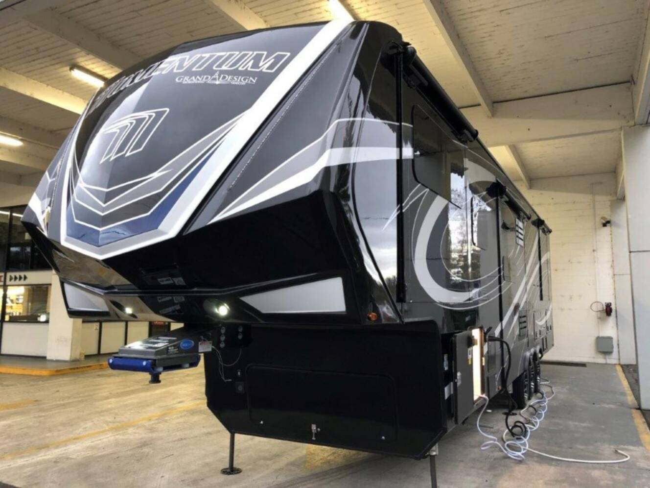 A photo of this 2021 Grand Design MOMENTUM M-CLASS 376TH