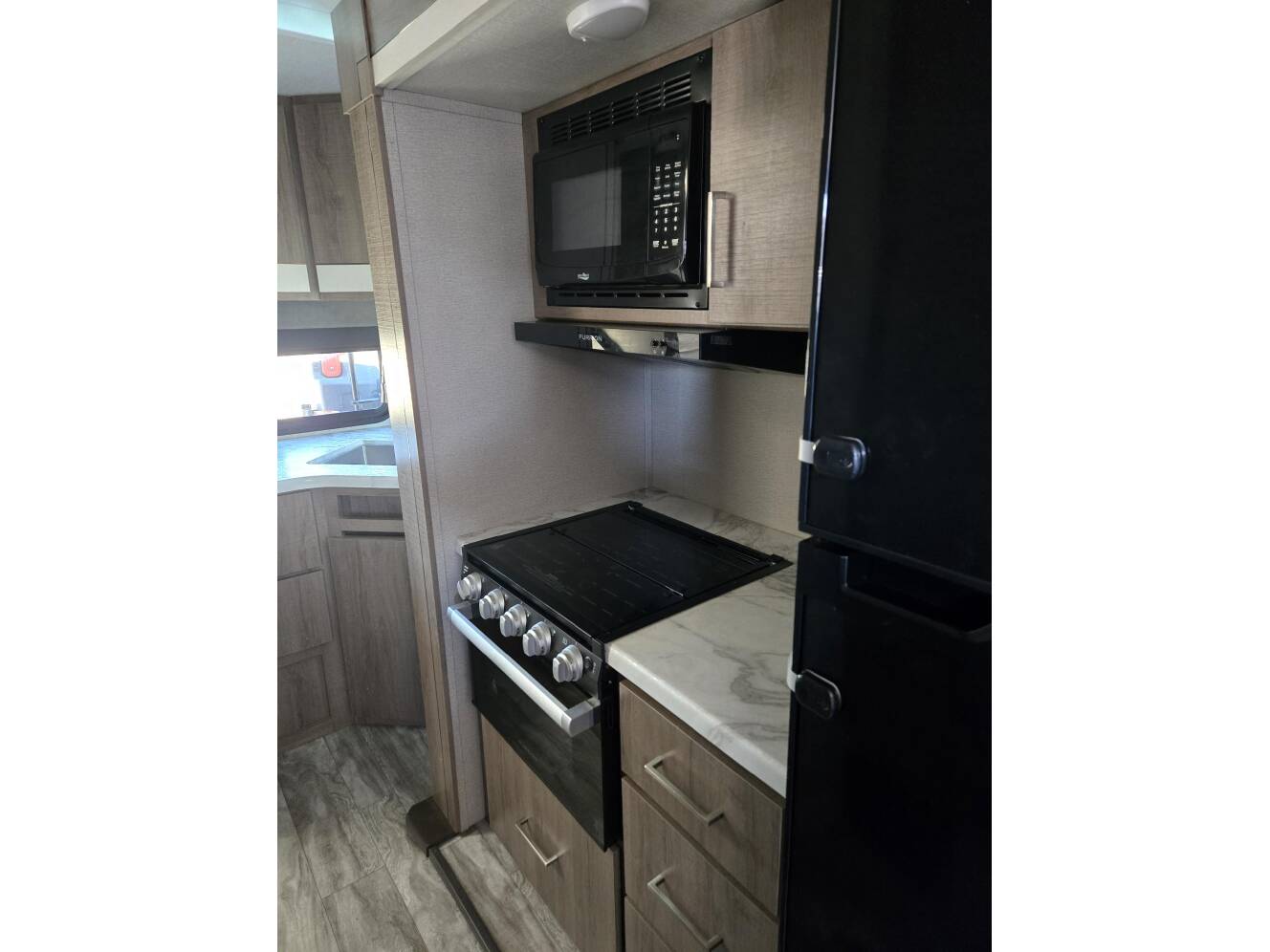 A photo of this 2023 Grand Design IMAGINE XLS 22MLE