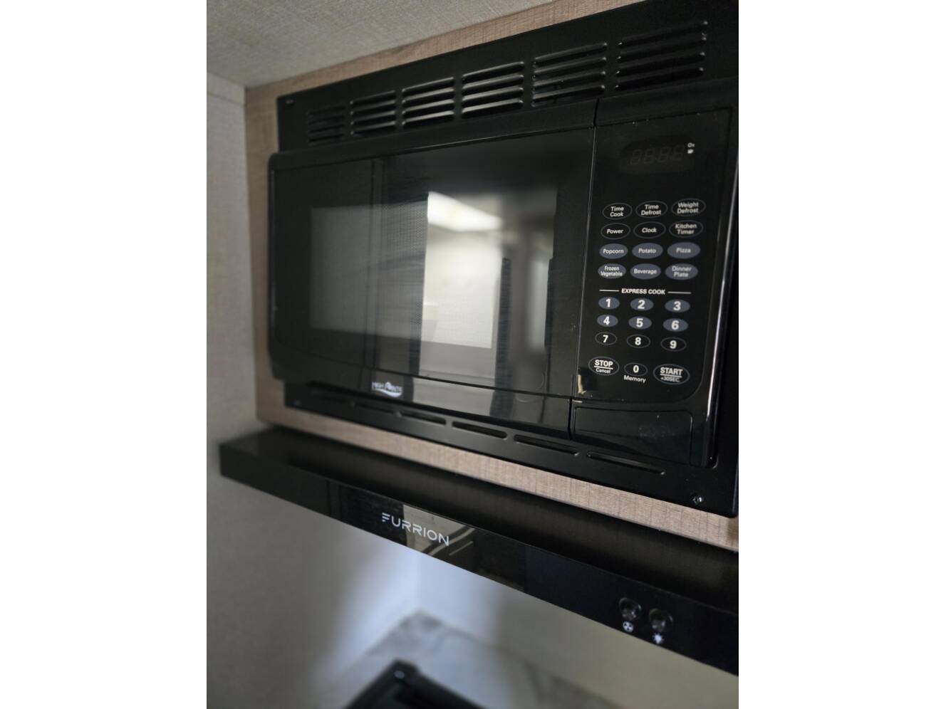 A photo of this 2023 Grand Design IMAGINE XLS 22MLE
