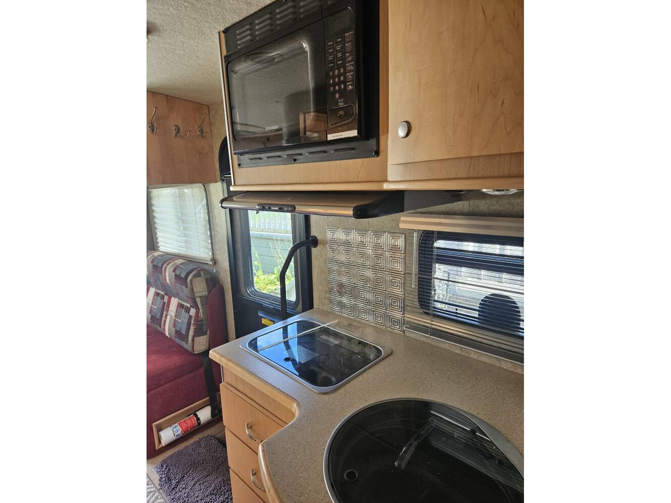 A photo of this 2009 Winnebago ITASCA NAVION IQ 24DL