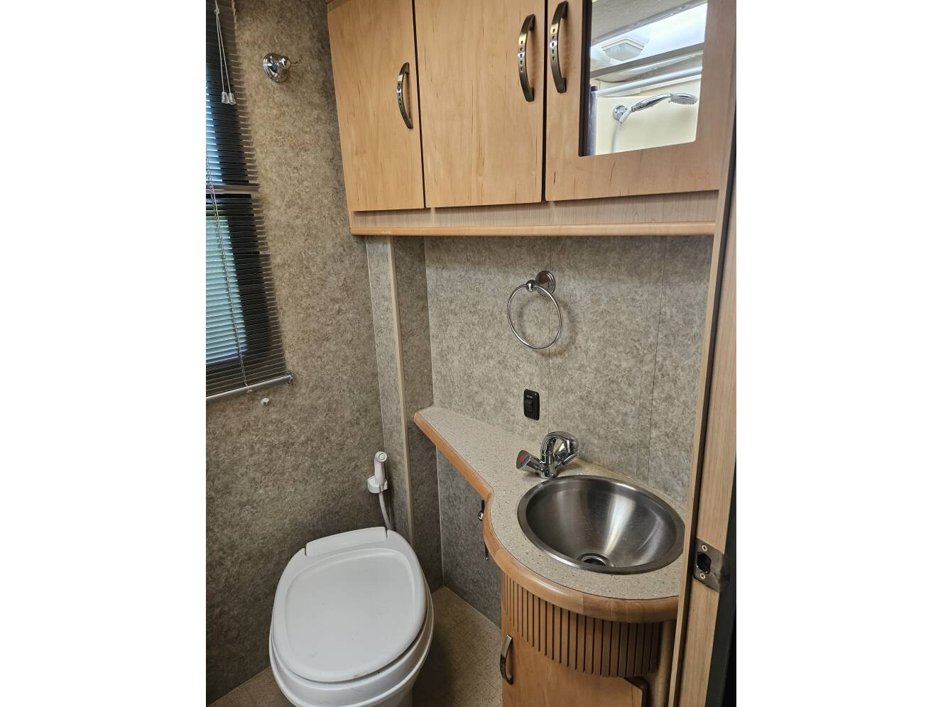 A photo of this 2009 Winnebago ITASCA NAVION IQ 24DL