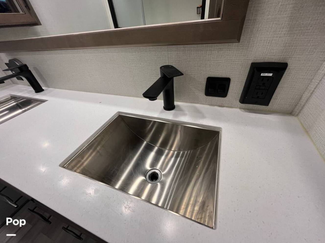 A photo of this 2024 Grand Design Solitude 390RK