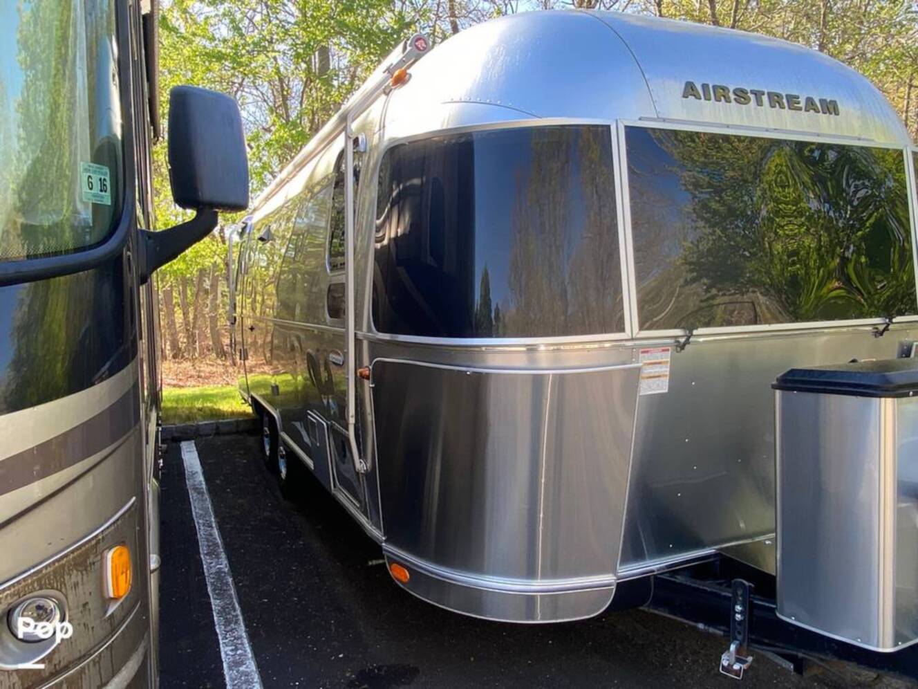 A photo of this 2018 Airstream International Serenity 25FB Queen