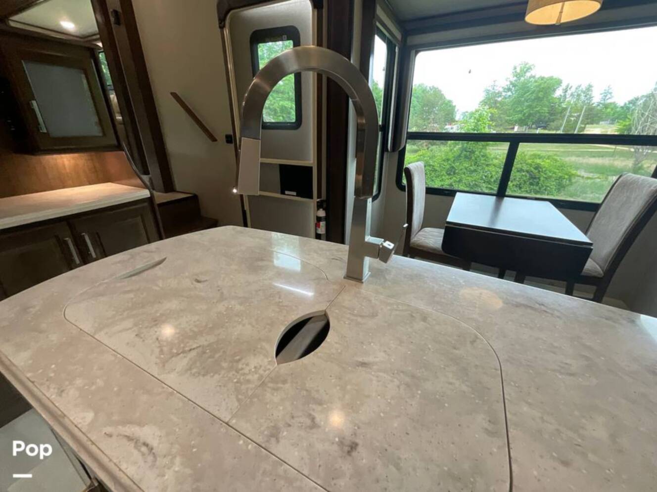 A photo of this 2021 Grand Design Solitude 380FL-R