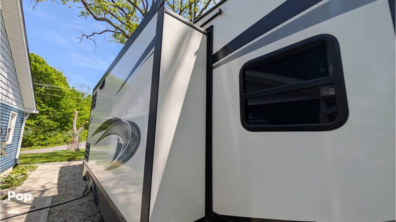 A photo of this 2021 Grand Design Reflection 295RL