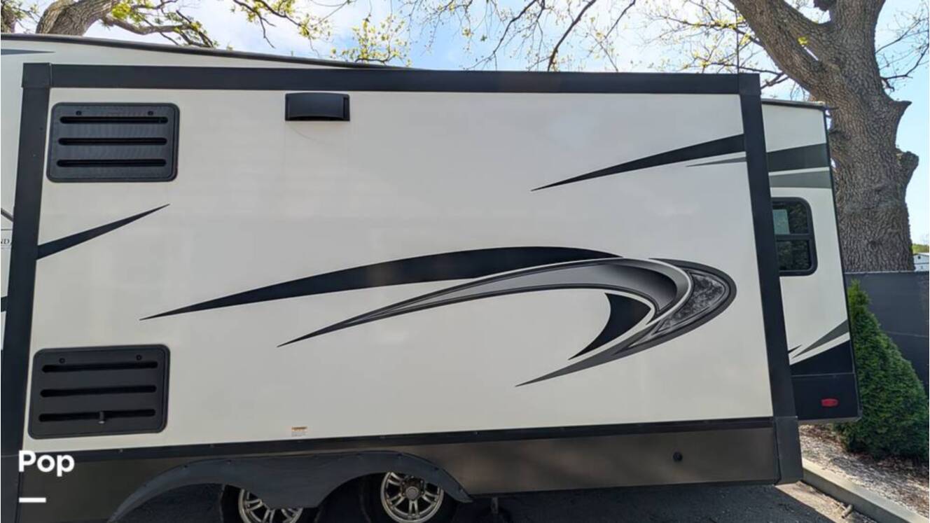 A photo of this 2021 Grand Design Reflection 295RL