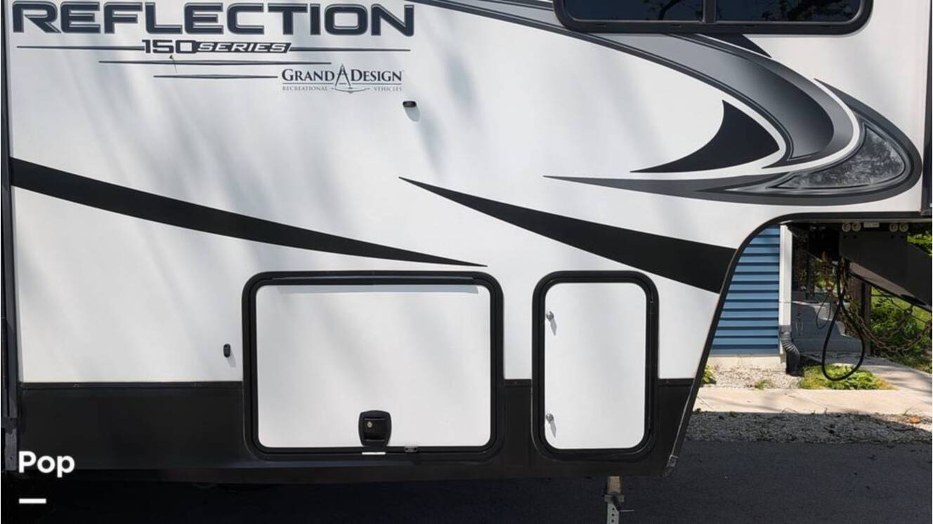 A photo of this 2021 Grand Design Reflection 295RL