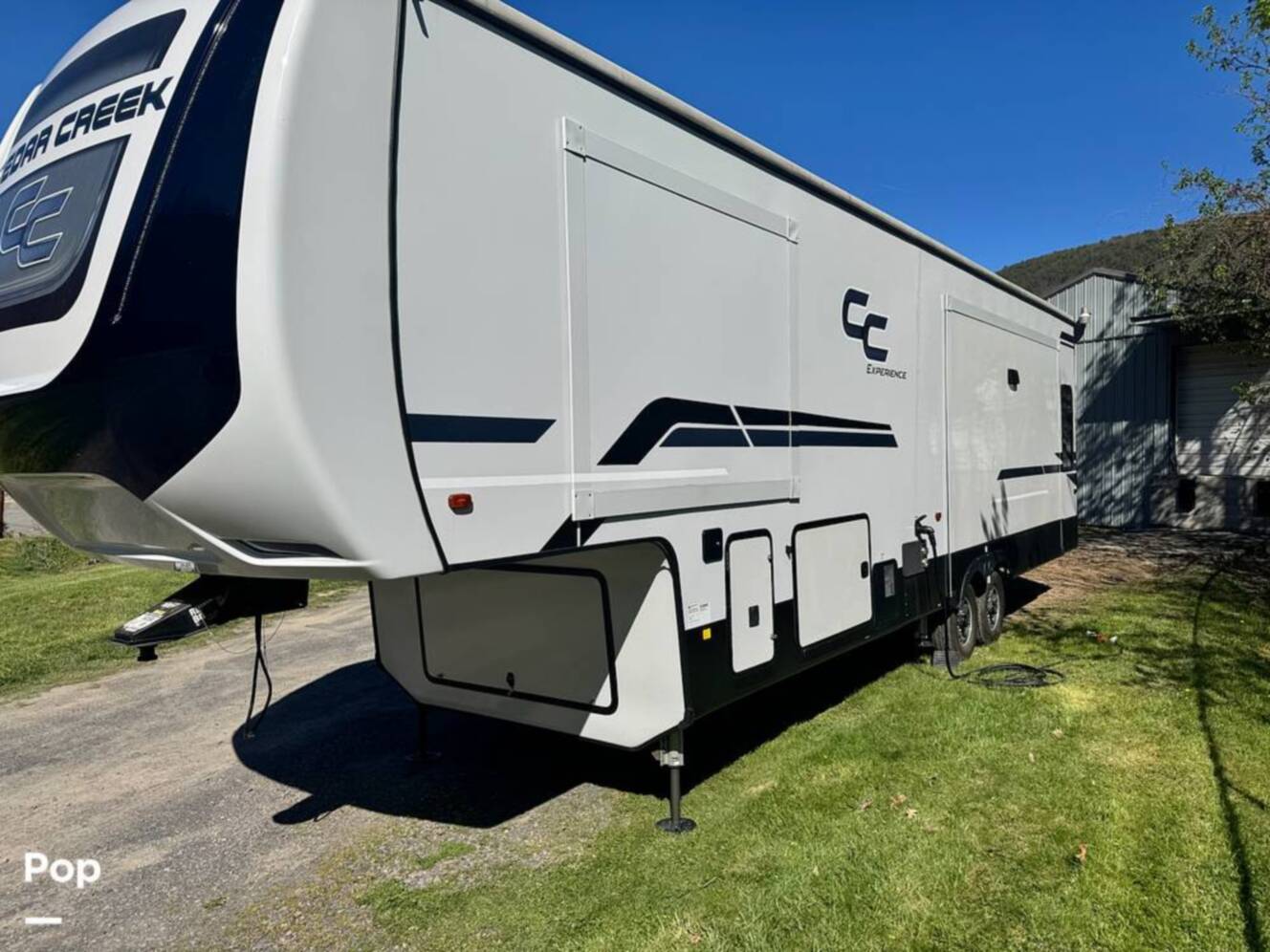 A photo of this 2023 Forest River Cedar Creek Experience 3425RL