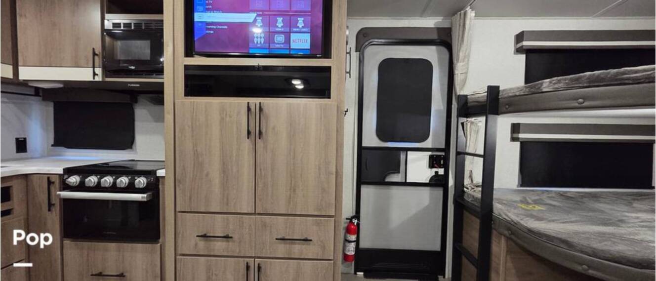 A photo of this 2023 Grand Design Imagine 2400BH