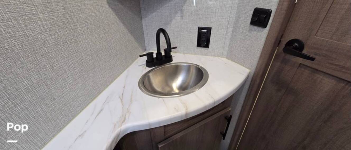 A photo of this 2023 Grand Design Imagine 2400BH