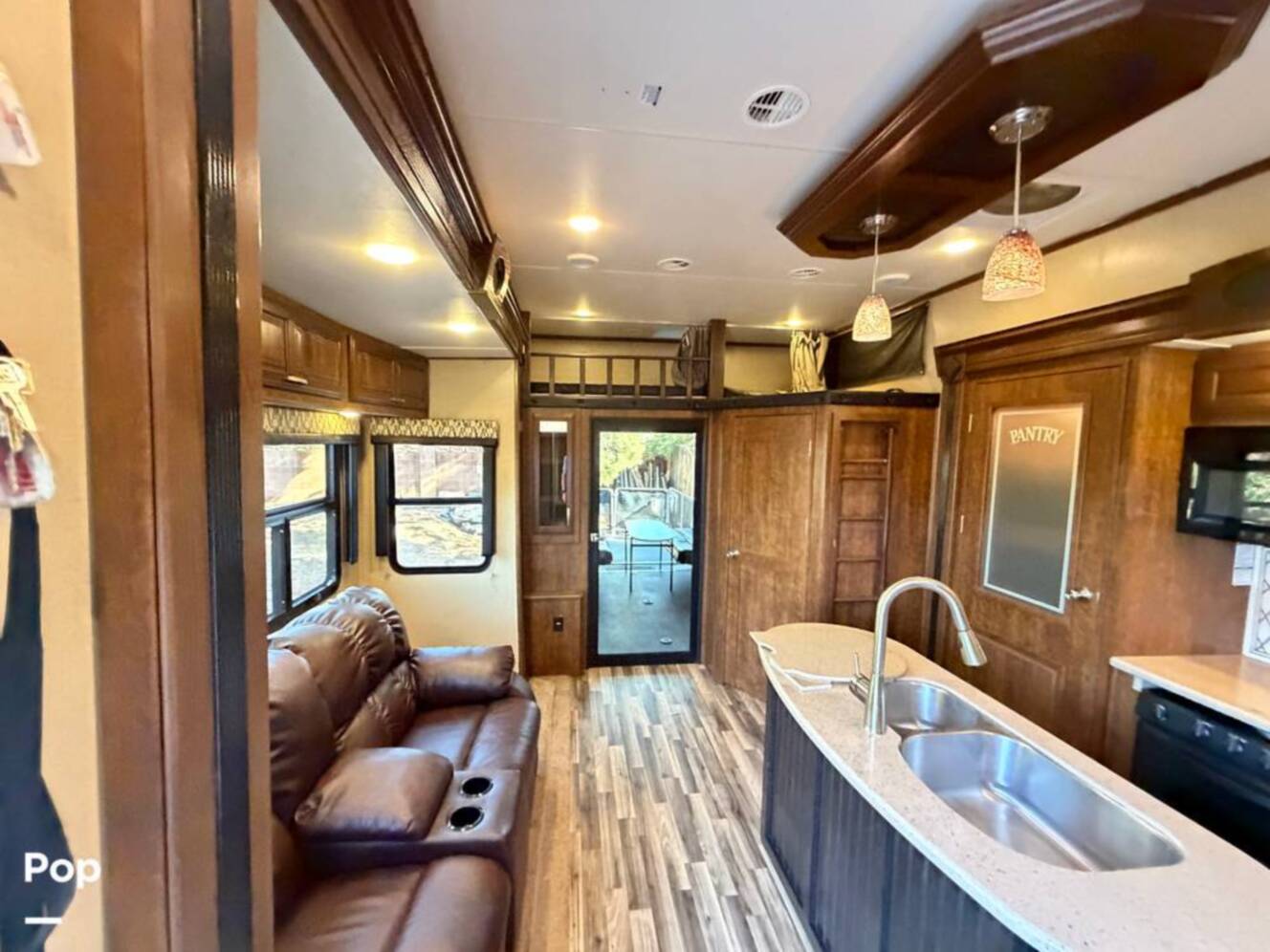 A photo of this 2015 Grand Design Momentum 385TH