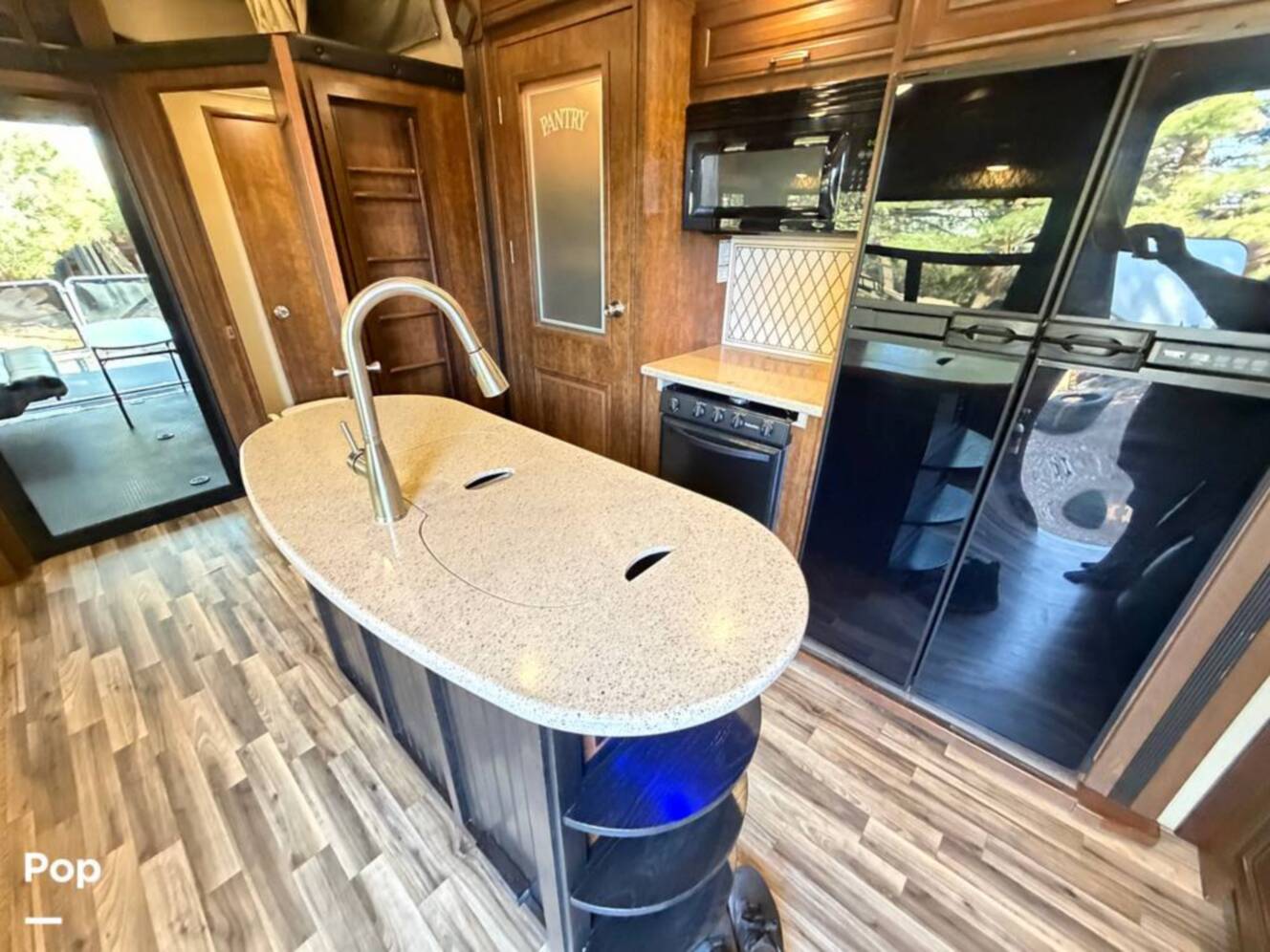 A photo of this 2015 Grand Design Momentum 385TH