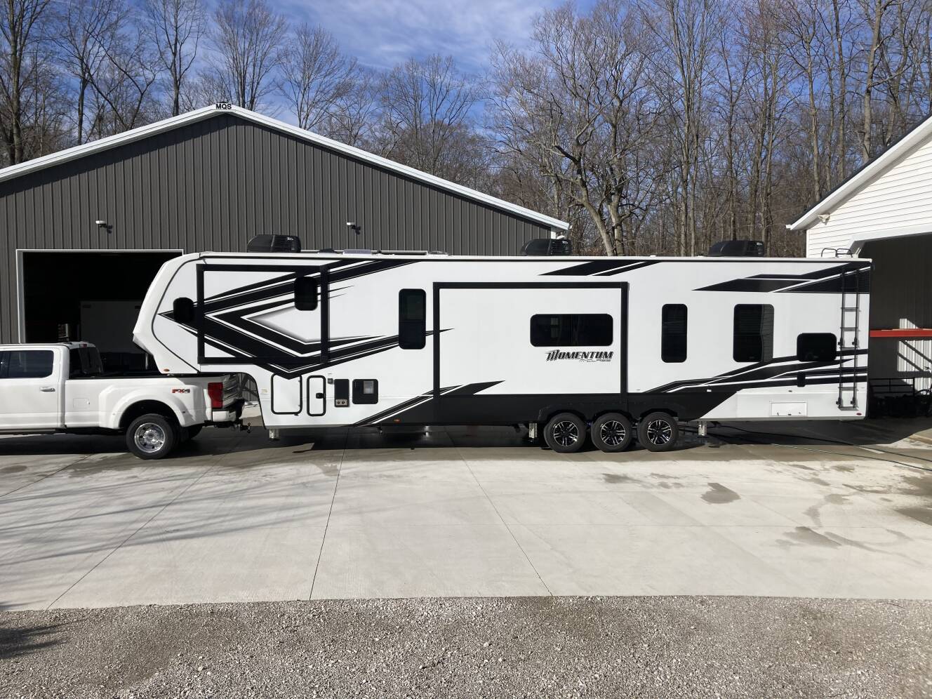 A photo of this 2022 Grand Design MOMENTUM M-CLASS 395MSR