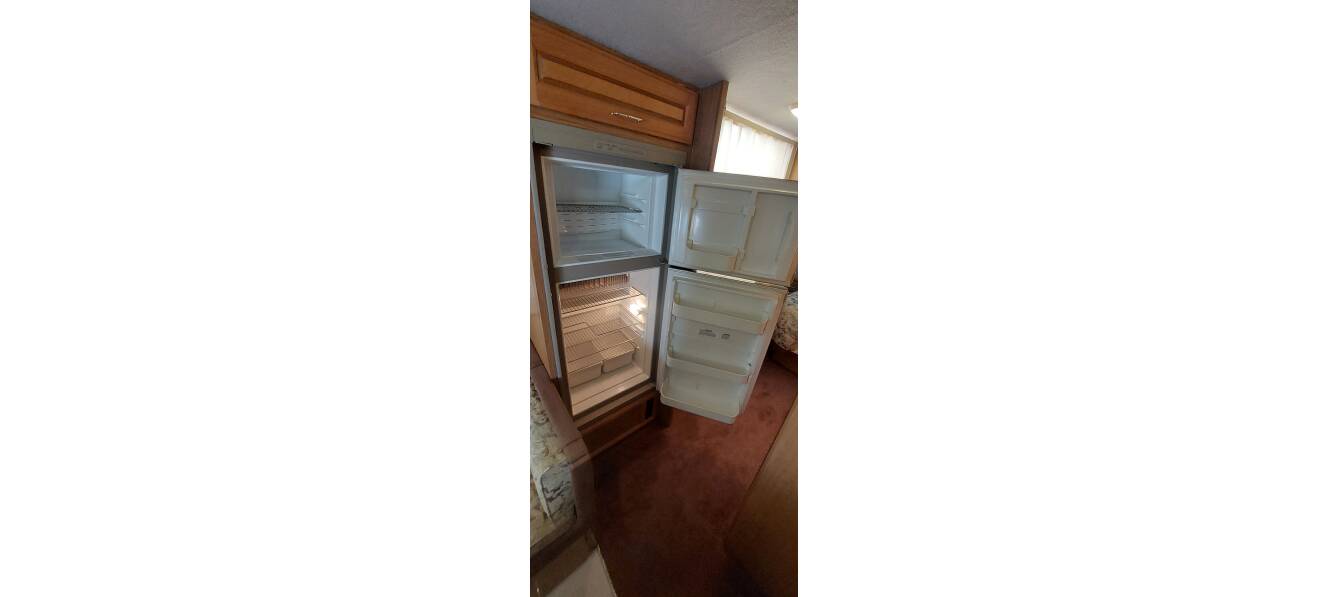 A photo of this 1999 Fleetwood STORM 30H